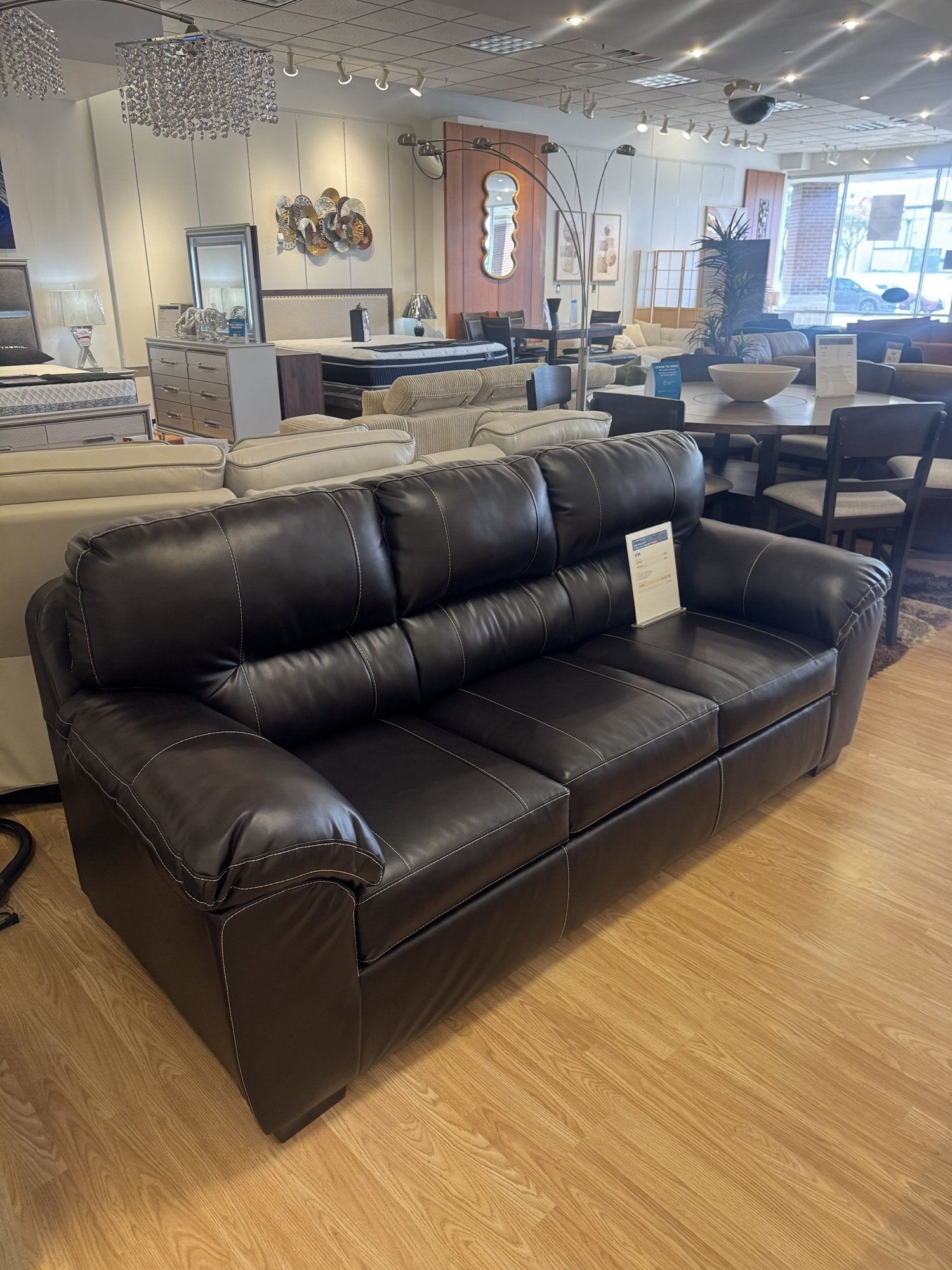 Brown faux leather sleeper sofa closeout at Palacio Furniture Arlington